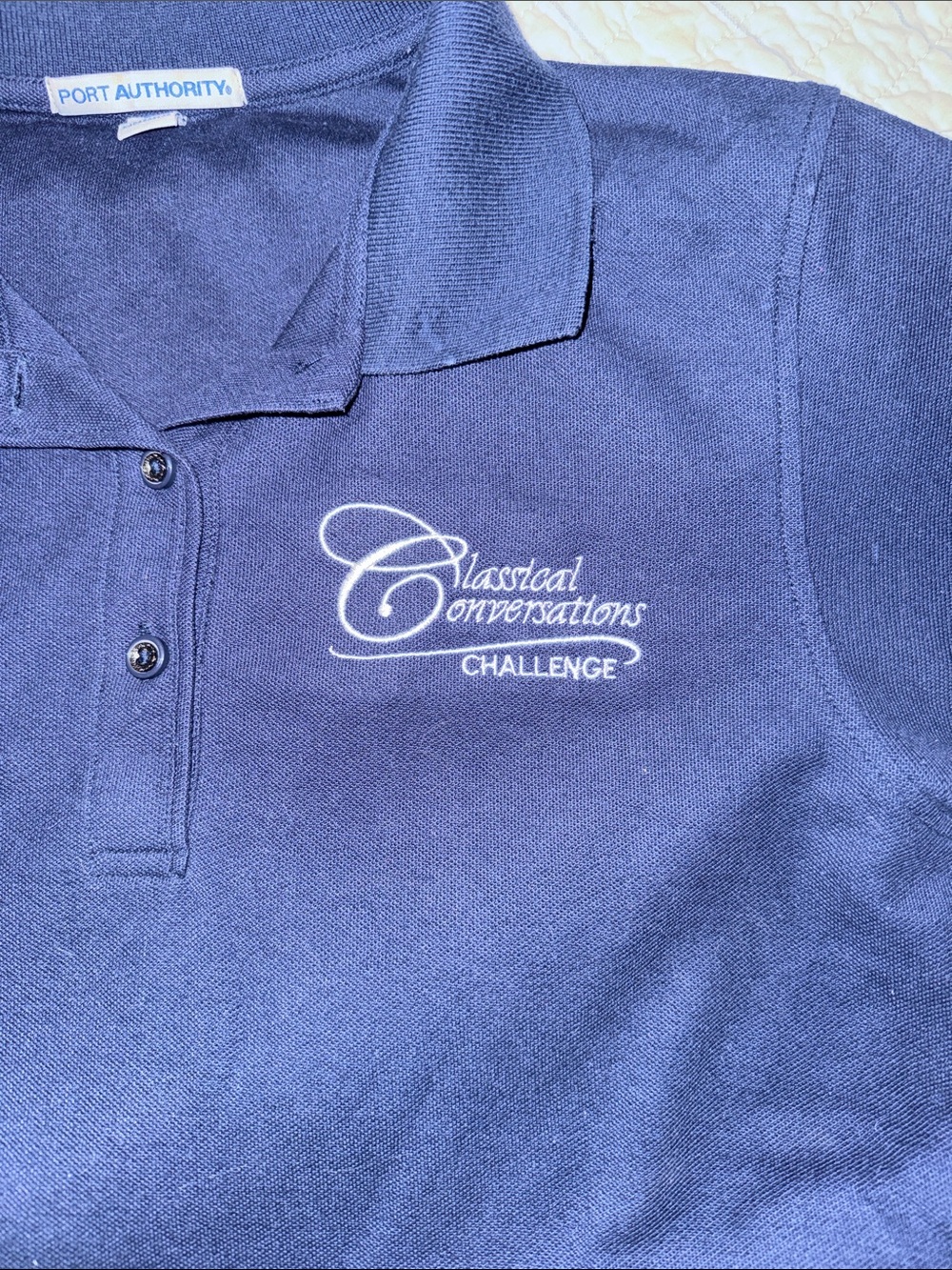 Navy Polo Shirt with Embroidered Classical Conversations Logo Ladies small